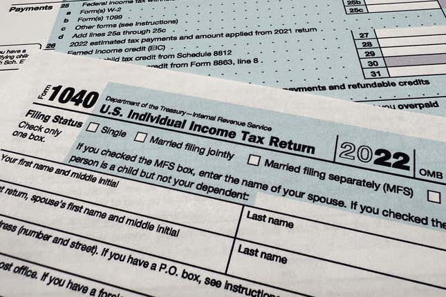 FILE - The Internal Revenue Service 1040 tax form for 2022 is seen on April 17, 2023. The IRS said Friday, April 26, 2024, more than 140,000 taxpayers filed their taxes through its new direct file pilot program. It says the program&#39;s users claimed more than $90 million in refunds, saving roughly $5.6 million in fees they would have spent with commercial tax preparation companies. (AP Photo/Jon Elswick, File)