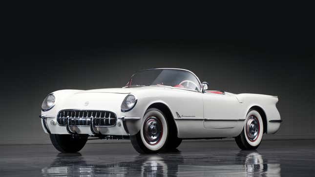 A photo of a white C1 Corvette in a studio. 