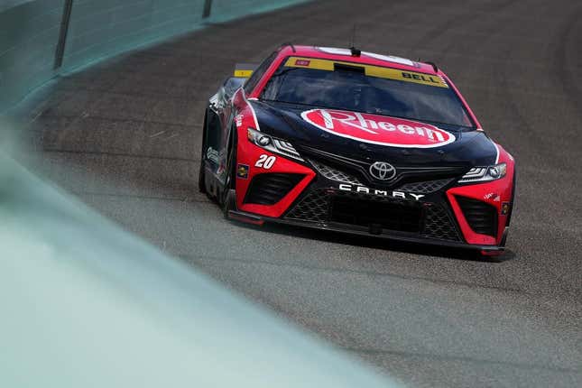 Oct 22, 2023; Homestead, Florida, USA; NASCAR Cup Series driver Christopher Bell (20) races during the 4EVER 400 presented by Mobil 1 at Homestead-Miami Speedway.