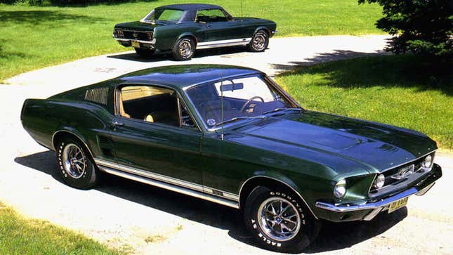 A photo of a dark green 1967 Ford Mustang. 