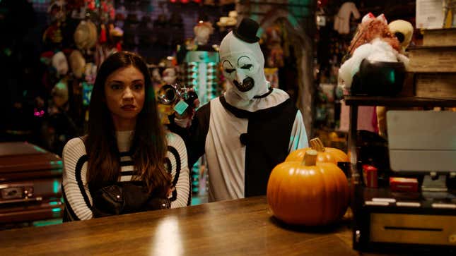 Lauren LaVera as Sienna Shaw and David Howard Thornton as Art the Clown in Terrifier 2