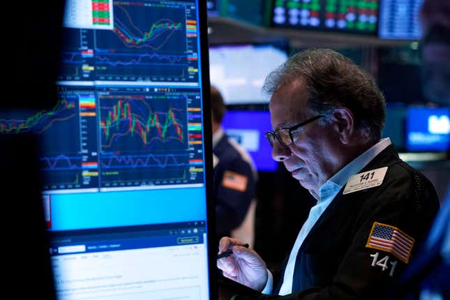 FILE - Trader Sal Suarino works on the floor of the New York Stock Exchange, Wednesday, Nov. 1, 2023. t’s easy to get swept up by Wall Street&#39;s hullabaloo over high interest rates, rising Treasury yields and other superlatives about financial markets. But the truth is that conditions in financial markets are actually reverting to historical norms, not diverging from them. (AP Photo/Richard Drew, File)