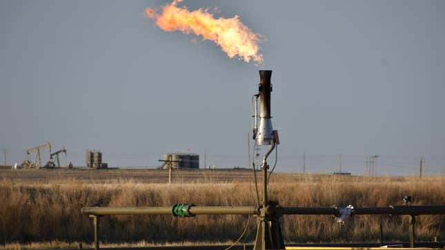 A flare, which burns excess gas, including methane, at a well pad in North Dakota.