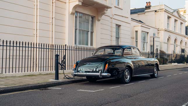 A photo of the vintage Bentley EV charging. 