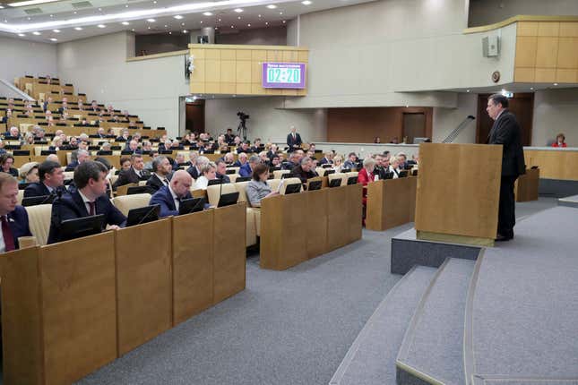 In this photo released by The State Duma, Russian lawmakers attend a session at the State Duma, the Lower House of the Russian Parliament in Moscow, Russia, on Friday, Nov. 17, 2023. The lower house of Russia&#39;s parliament, the State Duma, has passed a record federal budget which aims to increase spending by around 25% in 2024, with record amounts going to defense. (The State Duma, the Lower House of the Russian Parliament via AP)