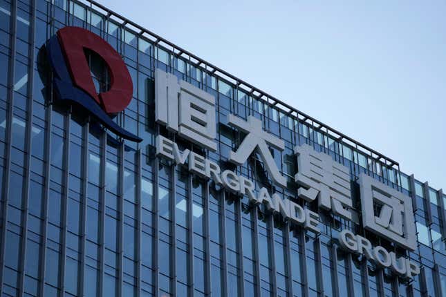 FILE - The Evergrande Group headquarters logo is seen in Shenzhen in southern China&#39;s Guangdong province on Sept. 24, 2021. A Hong Kong court on Monday, Oct. 30, 2023, adjourned a winding up hearing for property developer China Evergrande Group’s until Dec. 4.(AP Photo/Ng Han Guan, File)