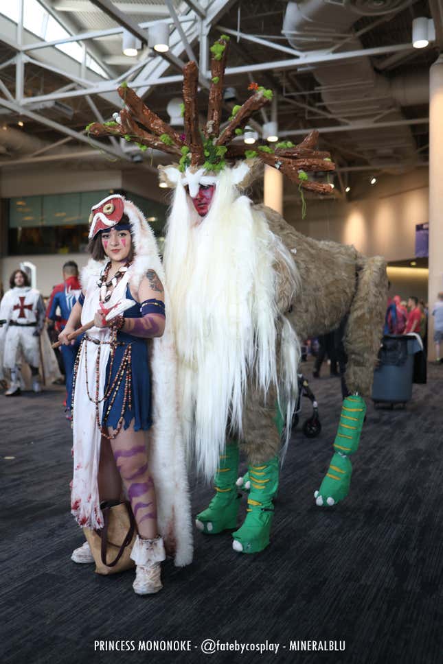 Princess Mononoke stands next to a Forest Spirit. 