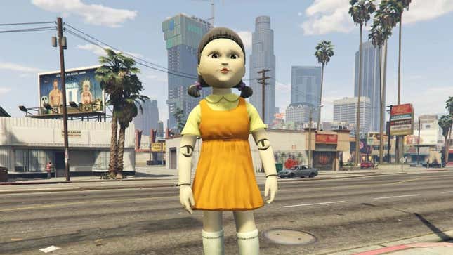 The robot doll from Squid Game stands on the sidewalk in GTA V's Los Santos. 