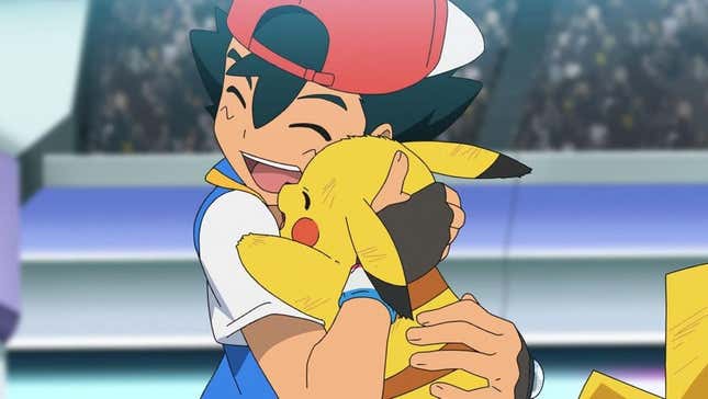 Ash et Pikachu se font un câlin.