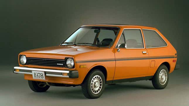 A photo of an orange Ford Fiesta hatchback