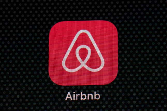 FILE - The Airbnb app icon is displayed on an iPad screen in Washington, D.C., on May 8, 2021. Airbnb says it’s banning the use of indoor security cameras in listings around the world by the end of next month. The San Francisco-based online rental platform said it making the change to simplify its security camera policy and continue efforts to prioritize privacy. (AP Photo/Patrick Semansky, File)