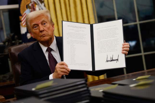 Image for article titled Trump Letting Go of &#39;DEI&#39; Employees, Trump Ends Remote Work for Federal Workers, Trump&#39;s Scary Executive Orders, Pardoning Jan. 6 Insurrectionists, Reaction to Elon Musk&#39;s Gesture, Black America&#39;s Reaction to Rappers Performing For Trump and More Trump News