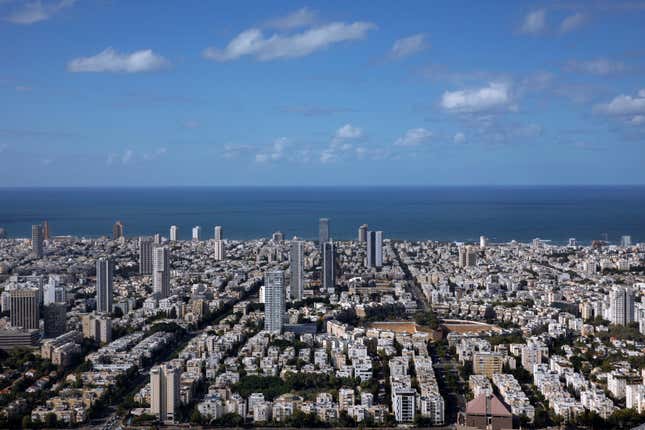 FILE - A general view shows the center of Tel Aviv, Israel, Thursday, Dec. 2, 2021. Prime Minister Benjamin Netanyahu has vowed to shut down Al Jazeera’s operations in Israel, calling it a “terror channel” that spreads incitement, after parliament passed a law clearing the way for the closure. (AP Photo/Oded Balilty, File)