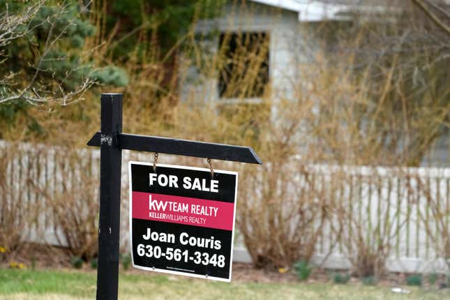 A &quot;for sale&quot; sign is displayed in front of a home in Mount Prospect, Ill., Monday, March 18, 2024. On Thursday, March 21, 2024, the National Association of Realtors reports on existing home sales for February. (AP Photo/Nam Y. Huh)