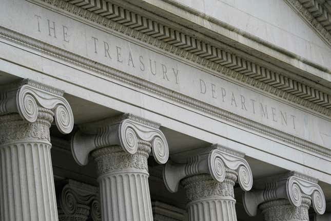 FILE - The Treasury Building is viewed in Washington, May 4, 2021. The Treasury Department has imposed sanctions on 13 members of Mexico’s powerful Sinaloa cartel and four Sonora, Mexico-based firms accused of trafficking fentanyl and other drugs into the United States, on Tuesday. Included in the sanctions are Juan Carlos Morgan Huerta, who allegedly manages cartel operations in Nogales and oversees the trafficking of multi-ton quantities of drugs, as well as members of his family, and his associates. (AP Photo/Patrick Semansky, File)