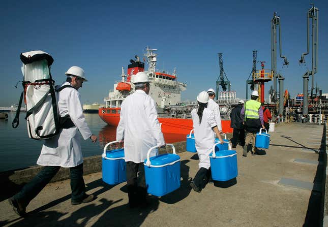 FILE - Technical personnel enter a ship loaded with drinking water docked in the Spanish port of Barcelona, Spain on May 13, 2008 as part of an unprecedented emergency plan to alleviate a drought in Barcelona. Tighter water restrictions for drought-stricken northeast Spain have gone in effect Wednesday Nov. 29, 2023 as authorities in Catalonia say that Barcelona may need to have fresh water shipped in by boat in the coming months. Catalonia is suffering its worst drought on record with reservoirs that provide water for some six million people filled to just 18% of their capacity. (AP Photo/Manu Fernandez, File)