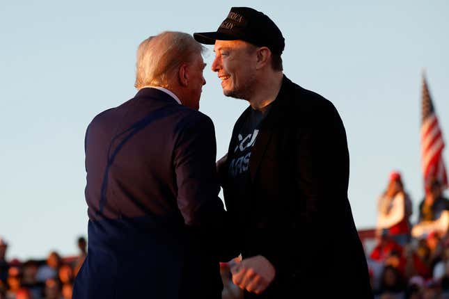 Tesla and SpaceX CEO Elon Musk and President-elect Donald Trump at a campaign rally in Pennsylvania in October 2024.