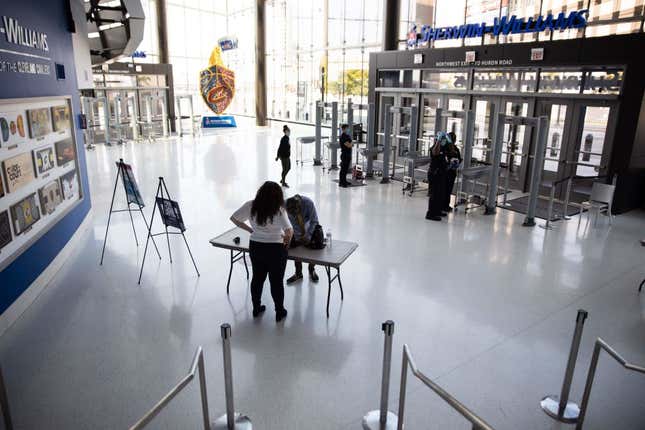 Registrants sign in to Rocket Mortgage Fieldhouse, where a voter registration event occurred on September 21, 2020, in Cleveland, Ohio. - Cleveland sports teams, the Browns of the NFL, Cavaliers of the NBA., and Indians of MLB, partnered on the voter registration to encourage Ohio voters to cast their ballot on election day. The group “More Than a Vote” is partnering with various organizations to help convert venues (like the Cavaliers’ Rocket Mortgage Fieldhouse) into voting sites, address the shortage in poll workers, particularly in communities of color, and fight voter suppression.