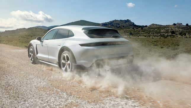 Promotional image of a Porsche Taycan Cross Turismo on a gravel road.