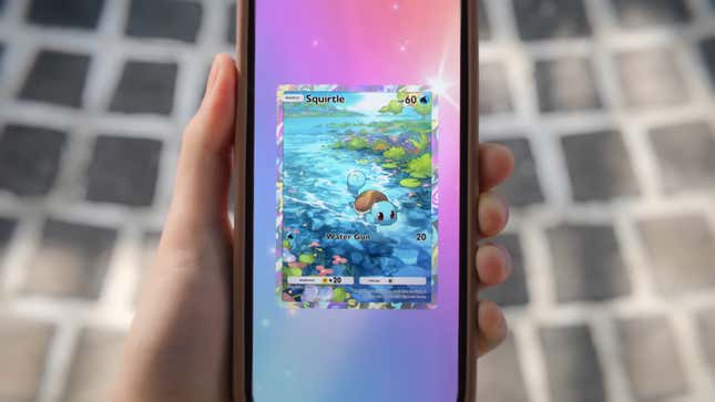 A screenshot of a trailer for Pokemon TCG Pocket, showing a full-art Squirtle card on the player's phone.