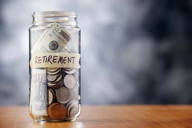 Jar full of coins and bills labeled "RETIREMENT"