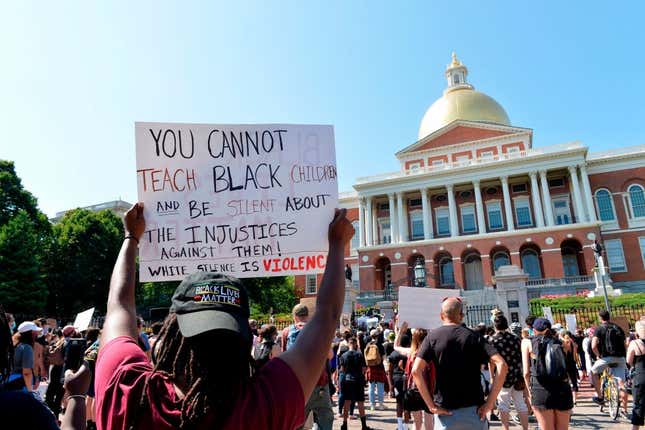 Protesters gather at the State House during a Juneteenth protest and demonstration in honor of Rayshard Brooks and other victims of Police Violence in Boston, Massachusetts on June 22, 2020.