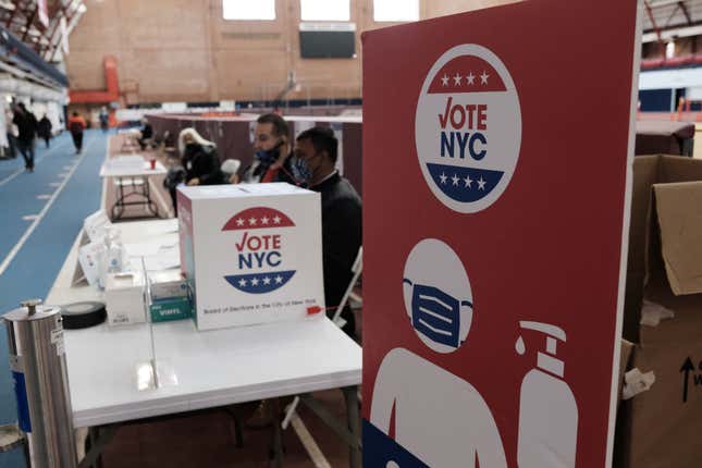 NEW YORK, NEW YORK - NOVEMBER 02: People visit a voting site at a YMCA on Election Day, November 02, 2021, in the Brooklyn borough of New York City.