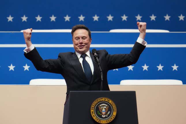 Tesla, SpaceX and X CEO Elon Musk gestures while speaking during President Trump's inauguration event at Capital One Arena