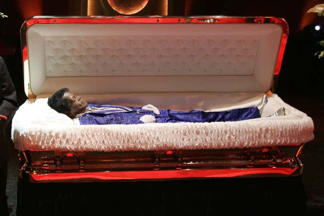 The body of James Brown lies in repose during a viewing at the Apollo theater on December 28, 2006 in New York City.