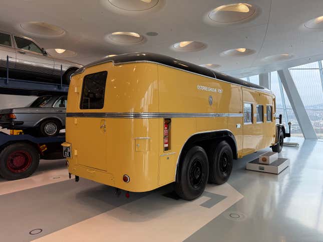 Rear 3/4 view of a yellow 1938 Mercedes-Benz O 10000 bus