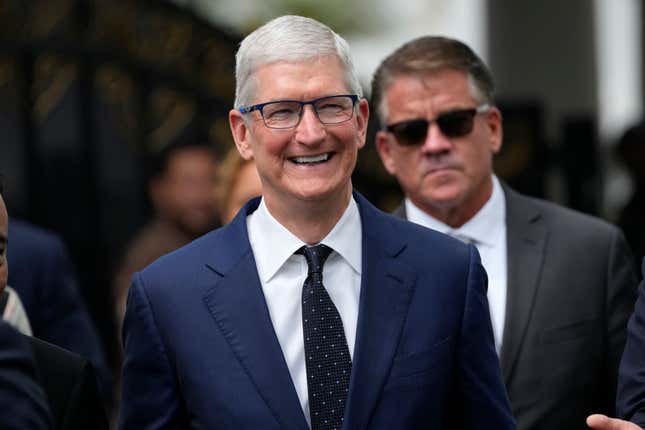 Apple CEO Tim Cook walks after a meeting with Indonesian President Joko Widodo at the palace in Jakarta, Indonesia, Wednesday, April 17, 2024.(AP Photo/Achmad Ibrahim)