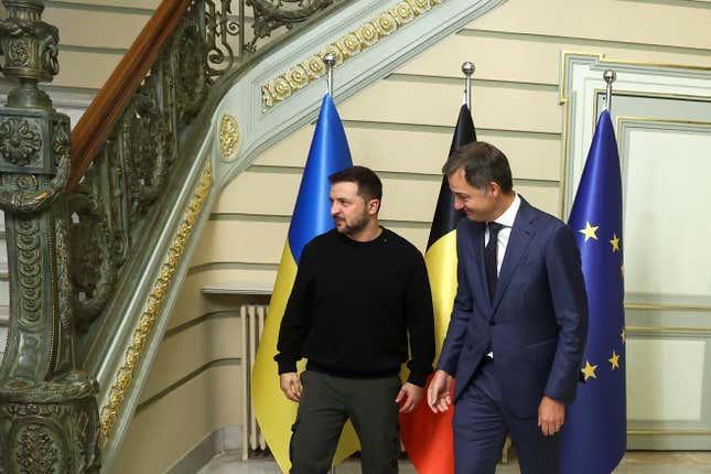 Ukraine&#39;s President Volodymyr Zelenskyy, left, is welcomed by Belgium&#39;s Prime Minister Alexander De Croo prior to a meeting at the prime ministers office in Brussels, Wednesday, Oct. 11, 2023. (Yves Herman, Pool Photo via AP)