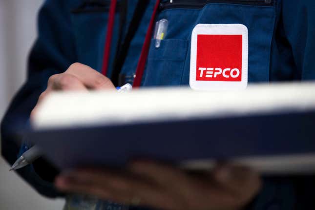 FILE - A Tokyo Electric Power Co. (TEPCO) logo is seen on a uniform of an employee at the company&#39;s Fukushima Dai-ichi nuclear power plant in Okuma town, Fukushima prefecture, Japan, on Feb. 23, 2017. A Tokyo court on Tuesday, Dec. 26, 2023 held only the Tokyo Electric Power Company Holdings, known as TEPCO, the operator of the tsunami-wrecked Fukushima nuclear power plant responsible for paying damages to dozens of evacuees. (Tomohiro Ohsumi/Pool Photo via AP, File)