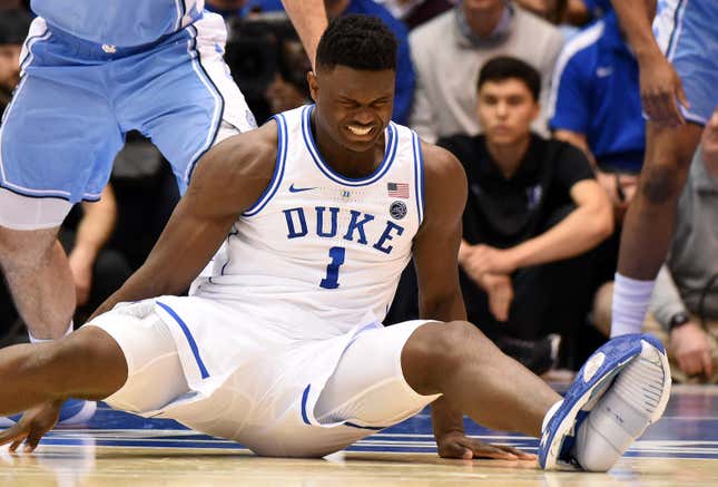 Feb 20, 2019; Durham, NC, USA; Duke Blue Devils forward Zion Williamson (1) reacts after falling during the first half against the North Carolina Tar Heels at Cameron Indoor Stadium. Mandatory Credit: Rob Kinnan-USA TODAY Sports - 12201420
