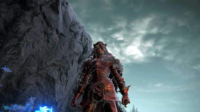 The player character in Elden Ring stands before the camera while holding bottles of perfume.