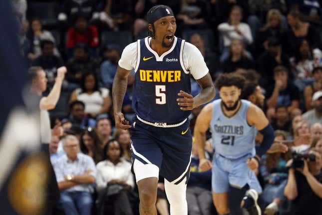 Oct 27, 2023; Memphis, Tennessee, USA; Denver Nuggets guard Kentavious Caldwell-Pope (5) reacts after a three point basket during the second half against the Memphis Grizzlies at FedExForum.