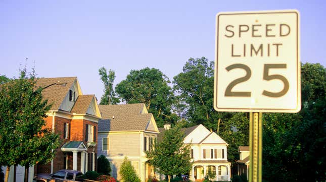 A 25 mph speed limit sign in a neighborhood