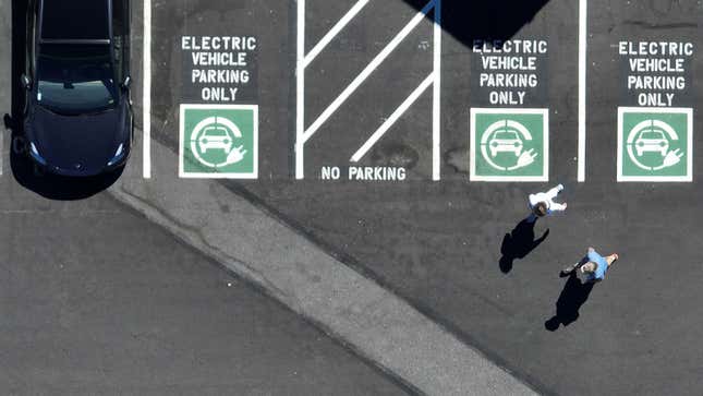 A photo of EV parking spaces in a parking lot. 