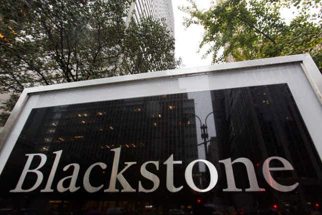 FILE - A sign for The Blackstone Group L.P. investment firm stands in front of their offices, Monday, Oct. 15, 2018, in New York. Private equity giant Blackstone will acquire the pet care app Rover in an all-cash deal valued at $2.3 billion, the companies announced Wednesday, Nov. 29, 2023. (AP Photo/Mark Lennihan, File)