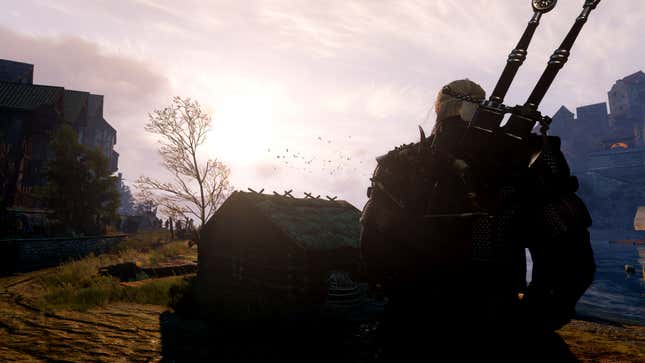 Geralt blickt auf einen Sonnenuntergang.