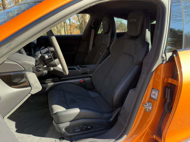 Front seat of a Nordic Gold 2025 Porsche Taycan GTS sedan