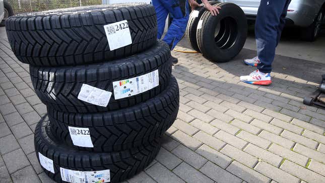 A photo of a stack of winter tires. 