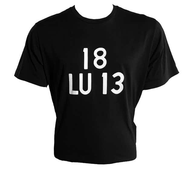 This image provided by Trackshot Media shows a black T-Shirt with the lettering 18 LU 13. Did you know Steven Soderbergh had an online marketplace with art and clothes and swag? Or, sorry, it&#39;s &quot;the artist formerly known as Steven Soderbergh&quot; according to the website. These are delightful deep cuts, but, the biggest seller on extension765.com is a soft, black vintage-inspired cotton t-shirt designed by Joanna Bush with 18 LU 13 printed in bold white letters. (Trackshot Media via AP)