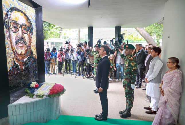 French President Emmanuel Macron pays homage to Bangladesh independence leader Sheikh Mujibur Rahman at the Bangabandhu Memorial Museum in Dhaka, Bangladesh, Monday, Sept.11, 2023. (AP Photo/Yeasin Kabir Joy)