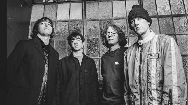 R.E.M. in 1996: Peter Buck, Bill Berry, Mike Mills, and Michael Stipe