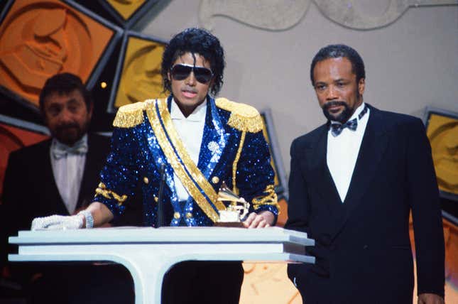 LOS ANGELES - FEBRUARY 28: Michael Jackson and Quincy Jones (R) at the 26th Annual Grammy Awards, Shrine Auditorium, Los Angeles, CA, February 28, 1984. 