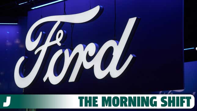 A photo of the Ford logo at the New York Auto Show. 