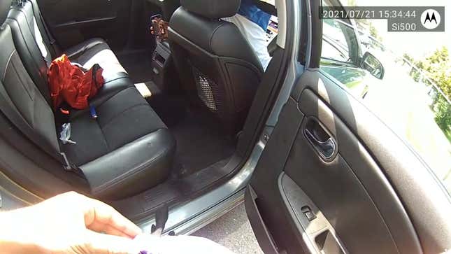 The view from an officer’s bodycam after he dropped a plastic baggie on the backseat of a car following a traffic stop. The baggie had been removed from a passenger’s pocket.