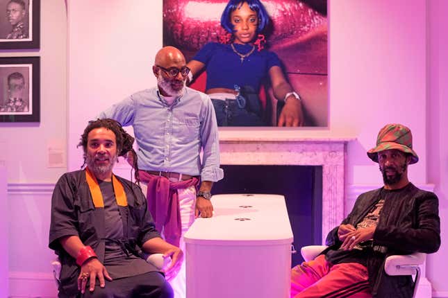 From left, curators Andrew Ibi, Jason Jules and Harris Elliott, pose for a photograph during a preview of the exhibition &quot;The Missing Thread: Untold Stories of Black British Fashion&quot;, at Somerset House, in London, Tuesday, Sept. 19, 2023. A new exhibition is opening in London to chart for the first time the contributions Black British culture made to U.K. fashion and design history and to celebrate Black designers who have not received public recognition. The exhibition opens on Thursday and pays tribute to the influence of Black designers in fashion from the 1970s. (AP Photo/Kin Cheung)