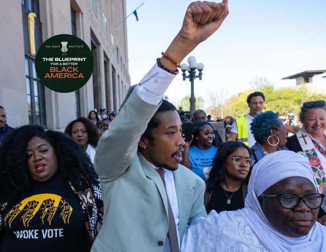 NASHVILLE, TN - APRIL 10: State Rep. Justin Jones of Nashville raises his fist after being reinstated to his seat on April 10, 2023, in Nashville. The move comes days after the Democrat was expelled for leading a protest on the House floor for gun reform in the wake of a mass shooting at a Christian school in which three 9-year-old students and three adults were killed by a 28-year-old former student. 